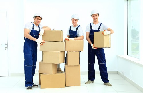 Careful packing and wrapping of household items for a move