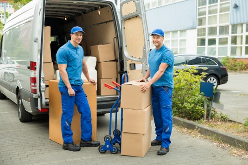 Packed boxes and furniture ready for apartment removals