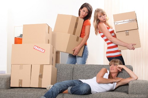 Local moving team handling boxes and furniture in Beckenham